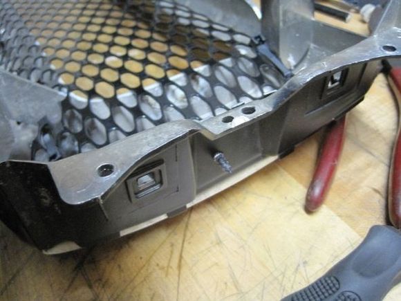 Make sure to put the screw in a place that wont interfere with the headlight door