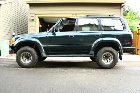 My car after the new struts and 32x12.5r15's are put on (and the back brakes are ground to clear the rims).