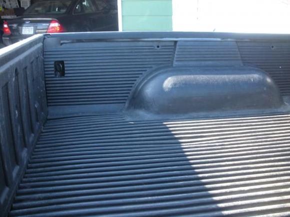 this is a shot of an over-rail bedliner modified to fit under-rail and it was shortened by a foot to match my new bed length.