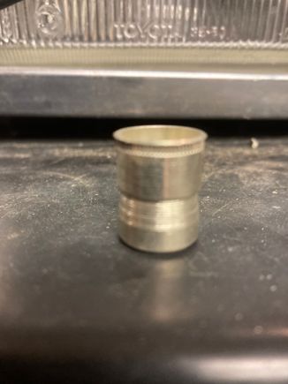 Rivnut, like a threaded rivot.