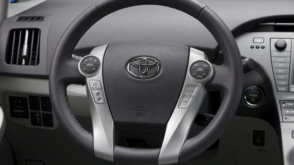 2010 Toyota Prius - showing round Touch Tracer controls that drivers operate with their thumbs