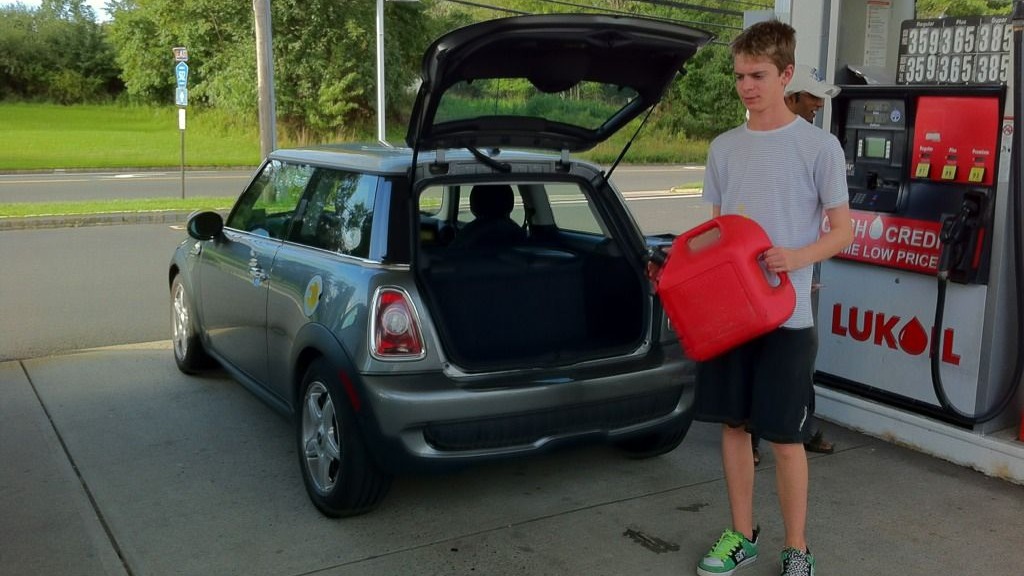 Filling up the Mini E at the gas station; photo, Michael Thwaite