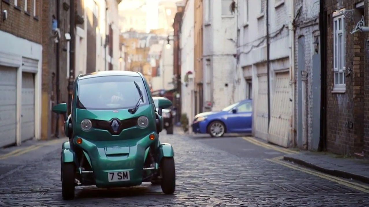 Sir Stirling Moss in his Renault Twizy electric car, London, May 2015