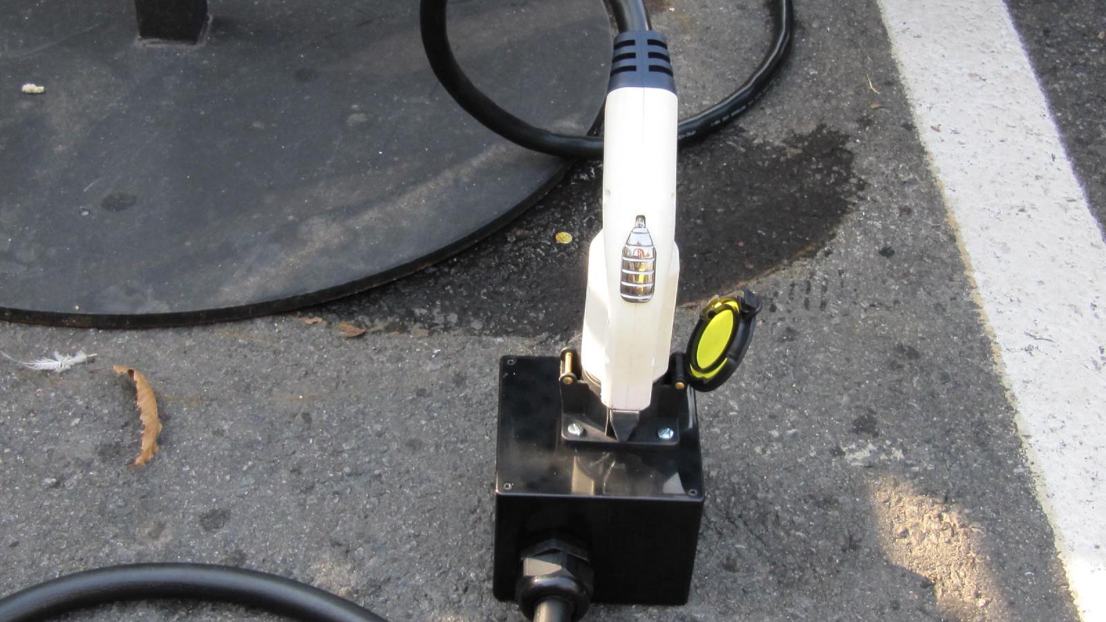 Home-made J-1772 adaptor for Tesla Roadster charging cord, built and used by Michael Thwaite