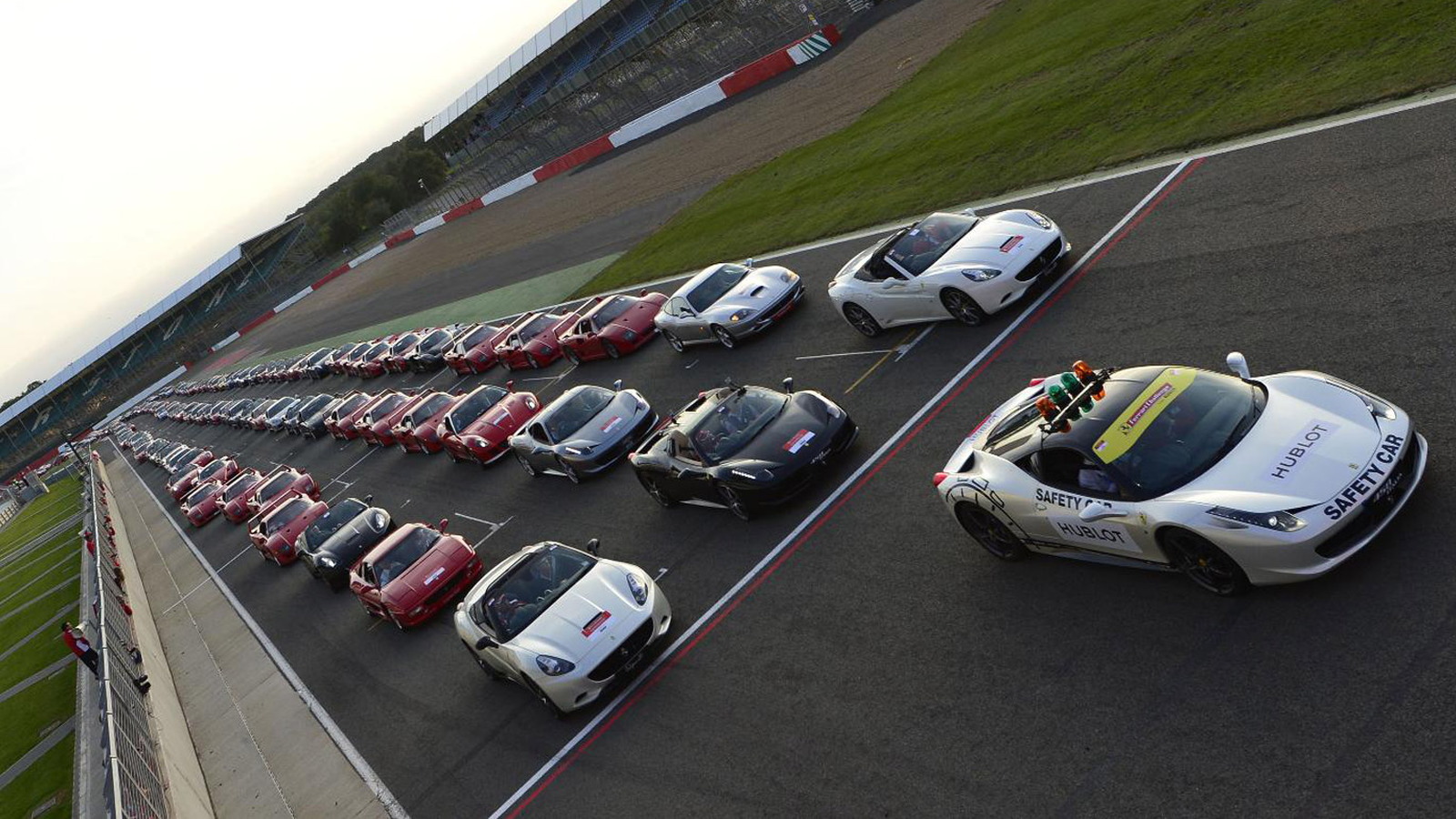 Gathering of 964 Ferraris at Silverstone in the UK have set a new world record
