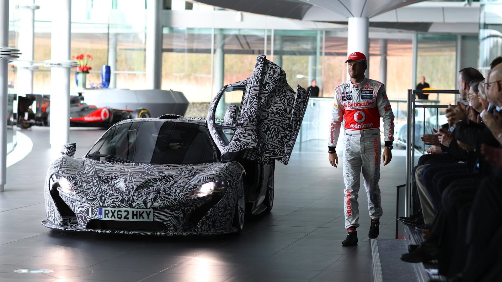 The upcoming McLaren P1 makes a cameo at the MP4-28 reveal