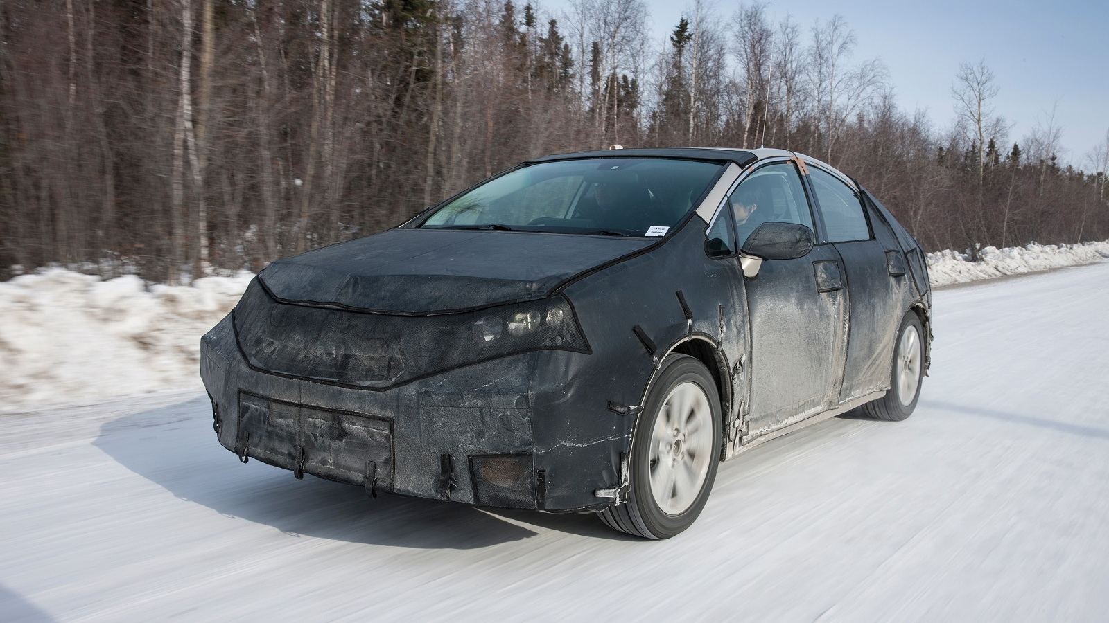 Toyota FCV hydrogen fuel cell vehicle prototype during cold-weather endurance testing in N America