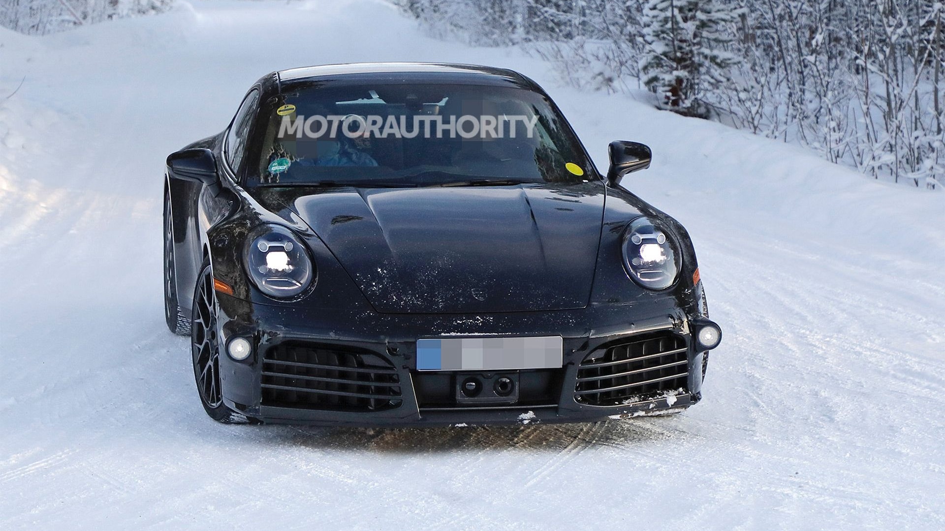 2024 Porsche 911 Carrera facelift spy shots - Photo credit: S. Baldauf/SB-Medien