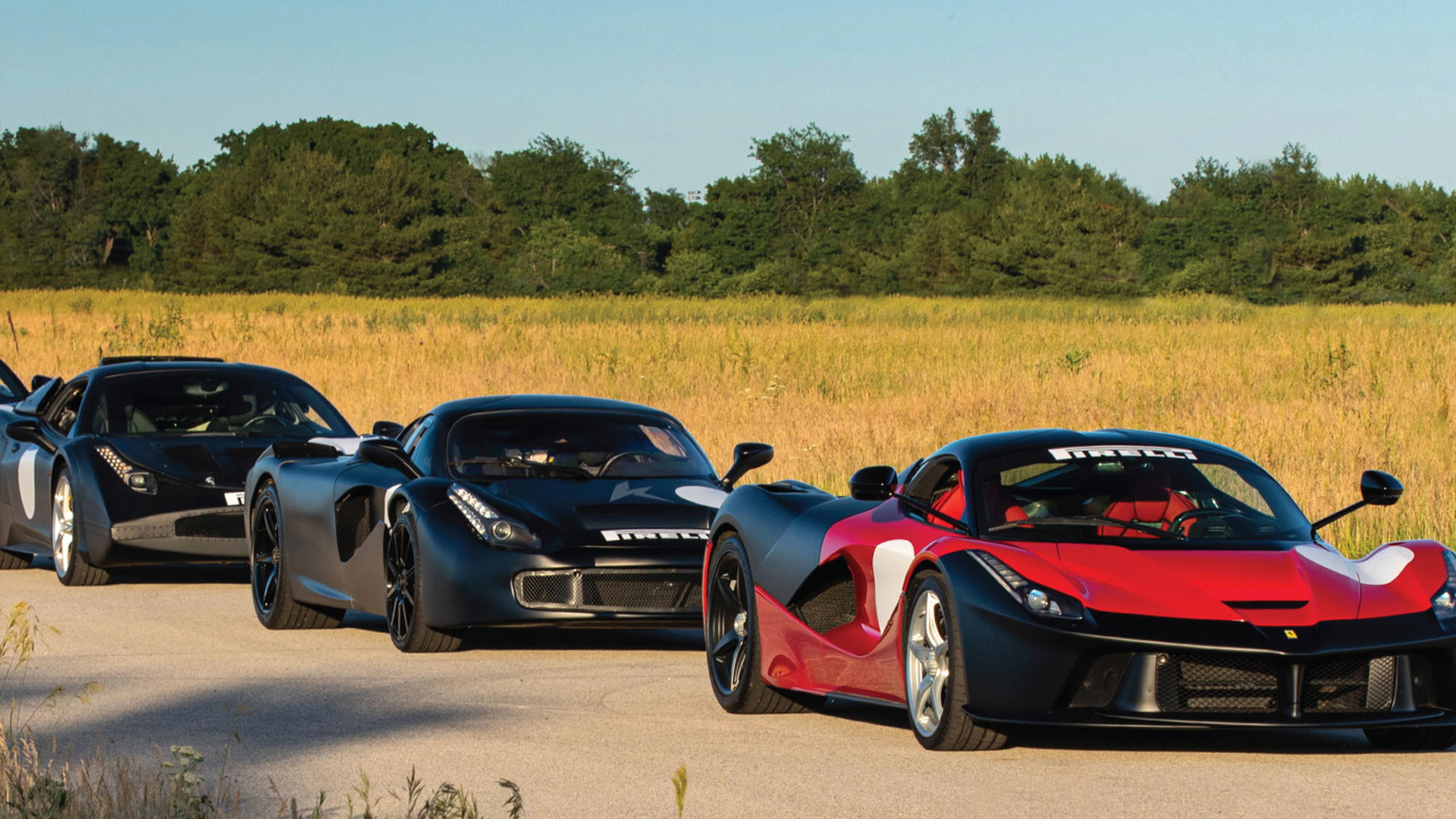 Trio of Ferrari LaFerrari prototypes - Photo credit: Mecum