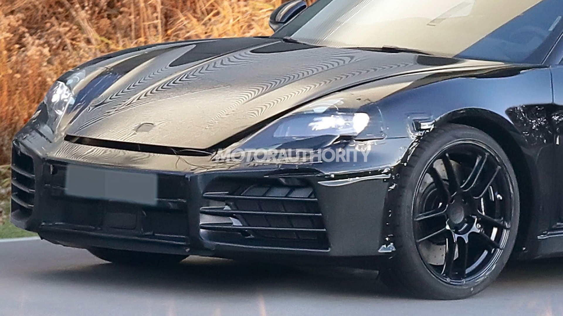 2026 Porsche 718 Boxster EV spy shots - Photo credit: Baldauf