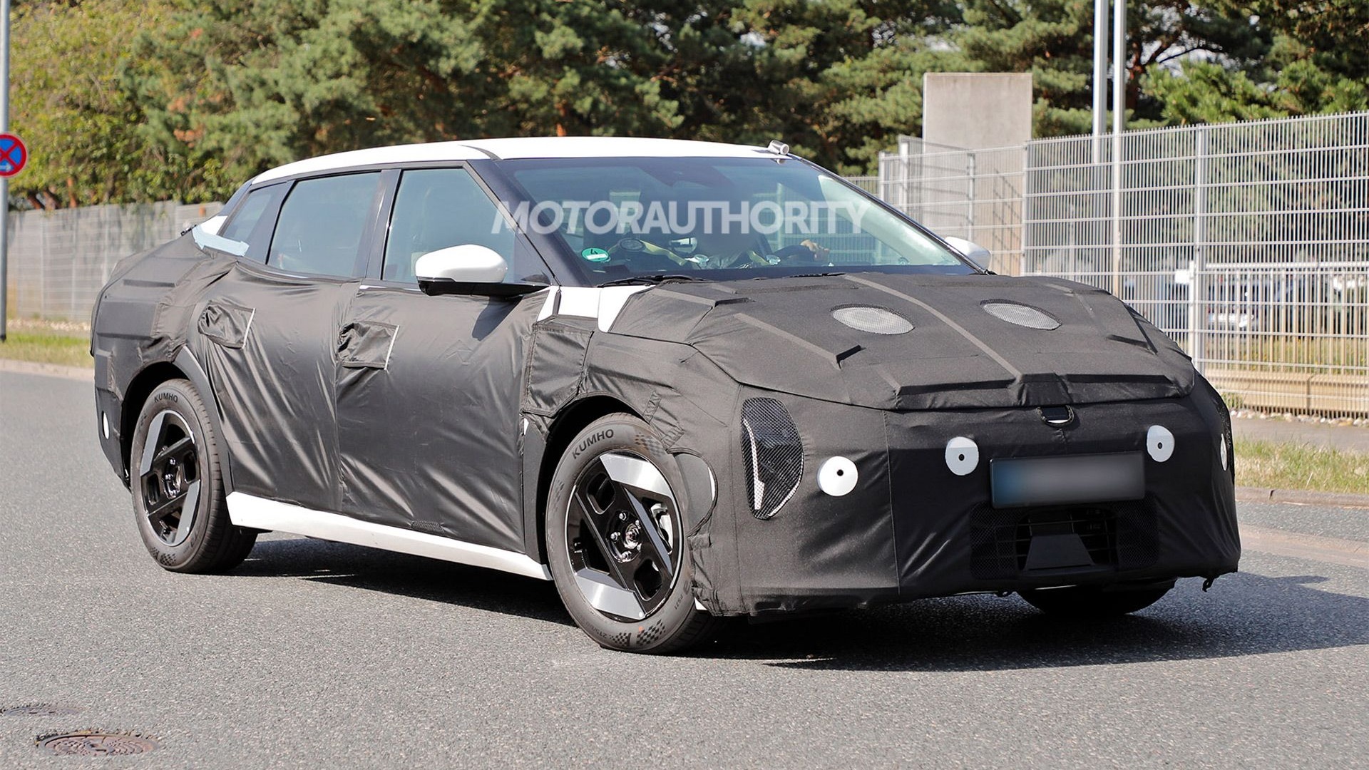 2026 Kia EV4 spy shots - Photo via Baldauf