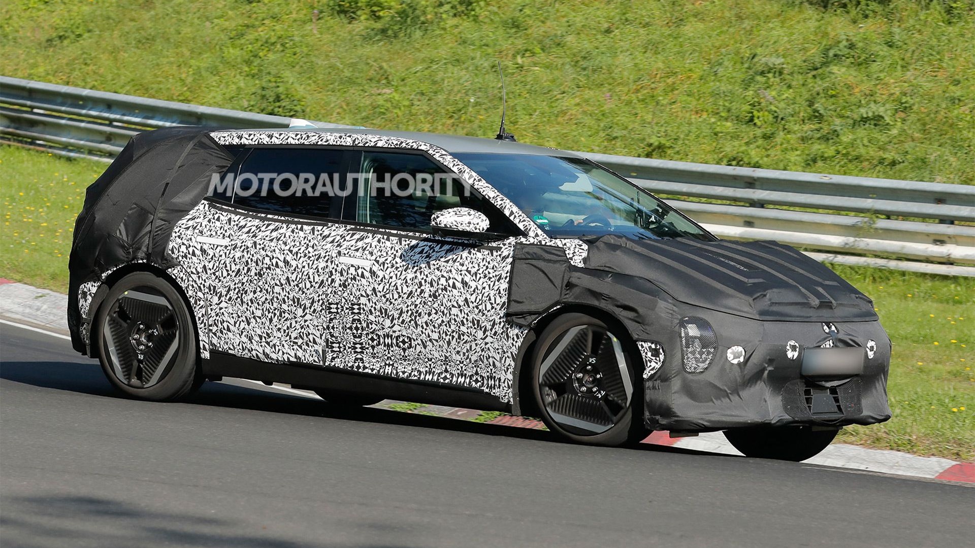 2026 Kia EV4 hatchback spy shots - Photo via Baldauf