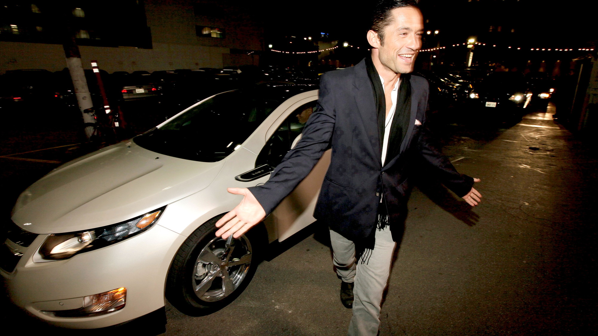 Enrique Murciano with 2011 Chevy Volt at Global Green Pre-Oscar Party, Feb 2011