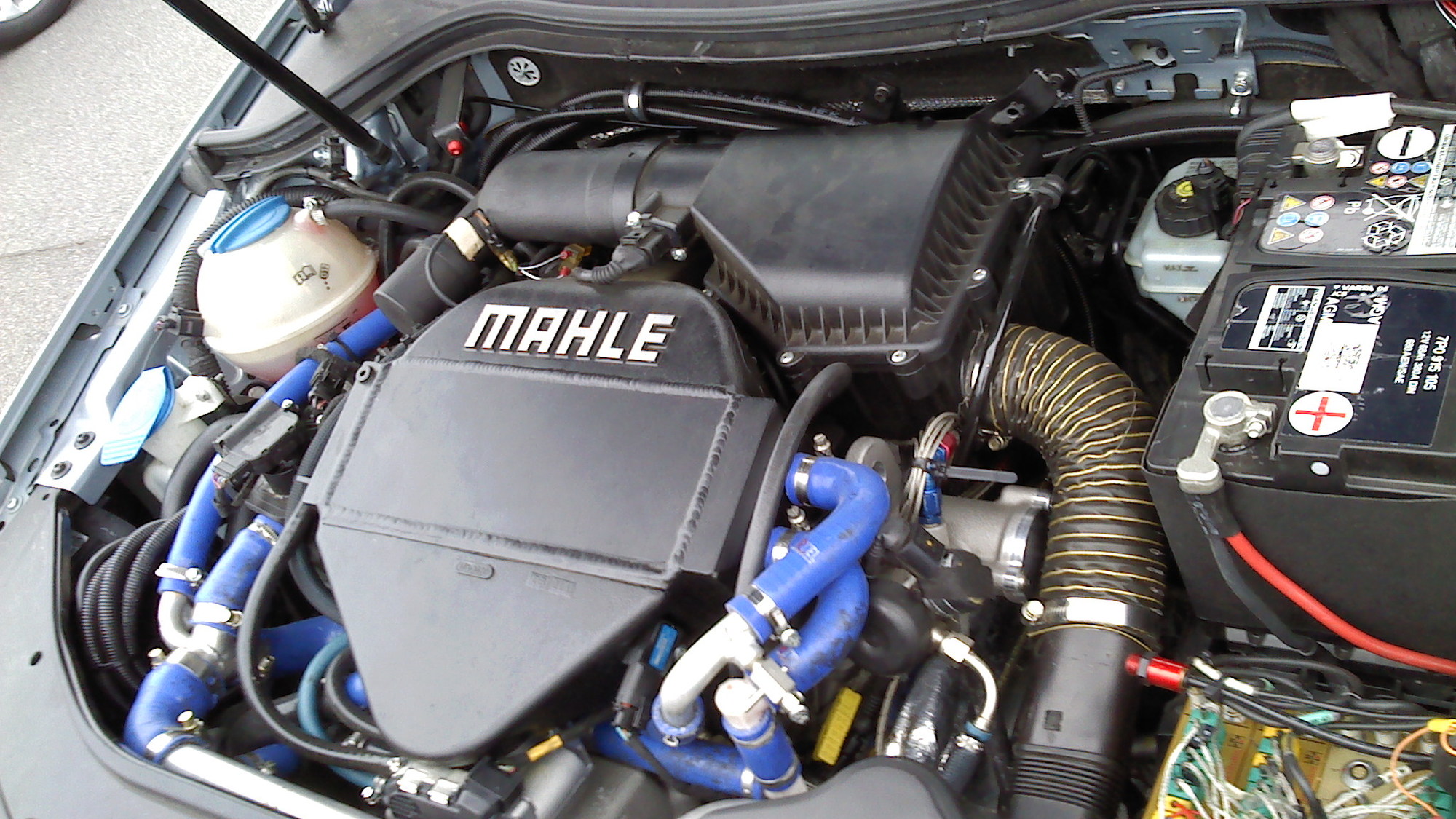 2009 VW Passat wagon test car w/Bosch-Mahle turbocharged 1.2-liter, 3-cyl engine, from WardsAuto.com