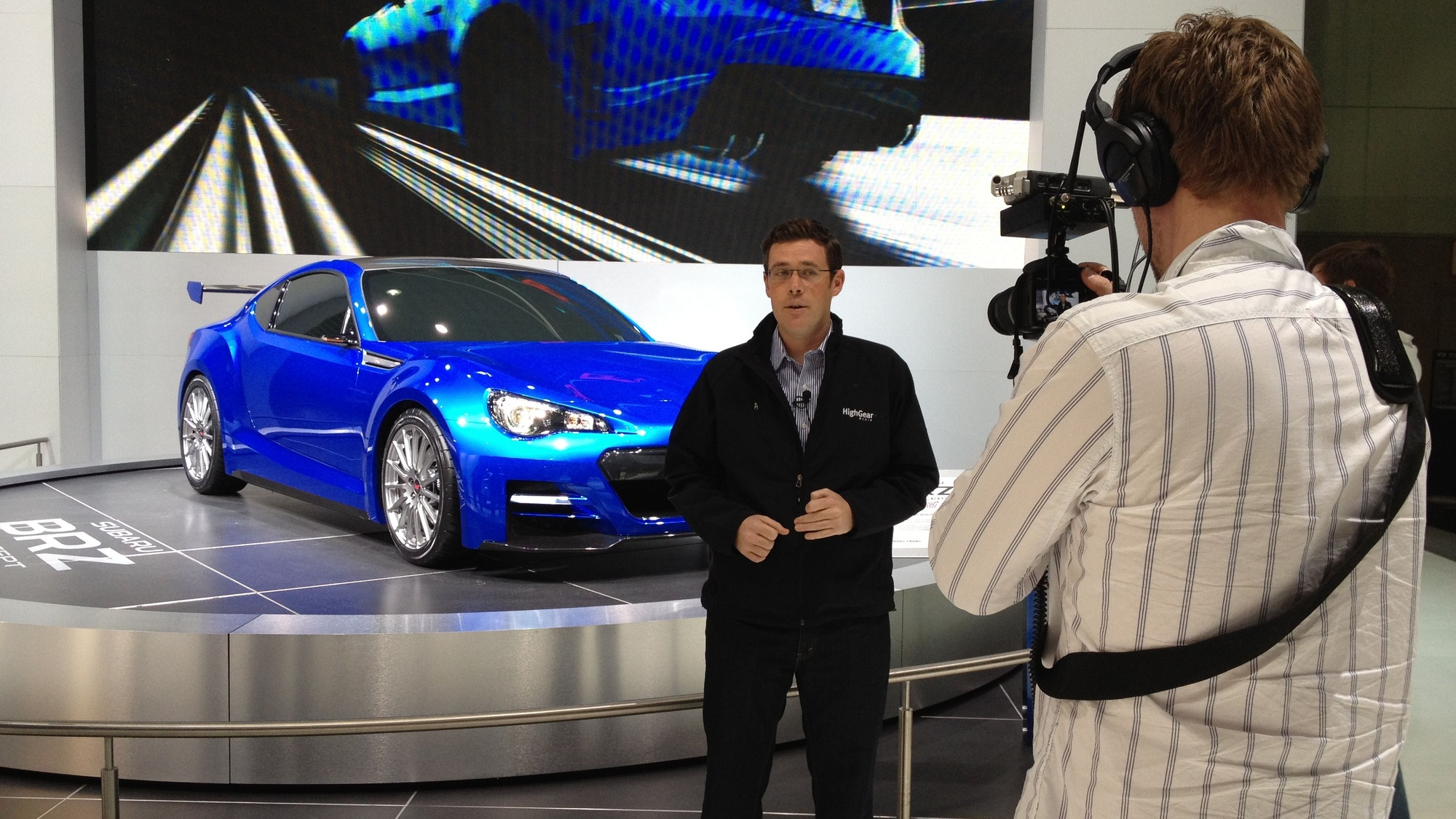 High Gear Media Team Shooting Video At 2011 Los Angeles Auto Show