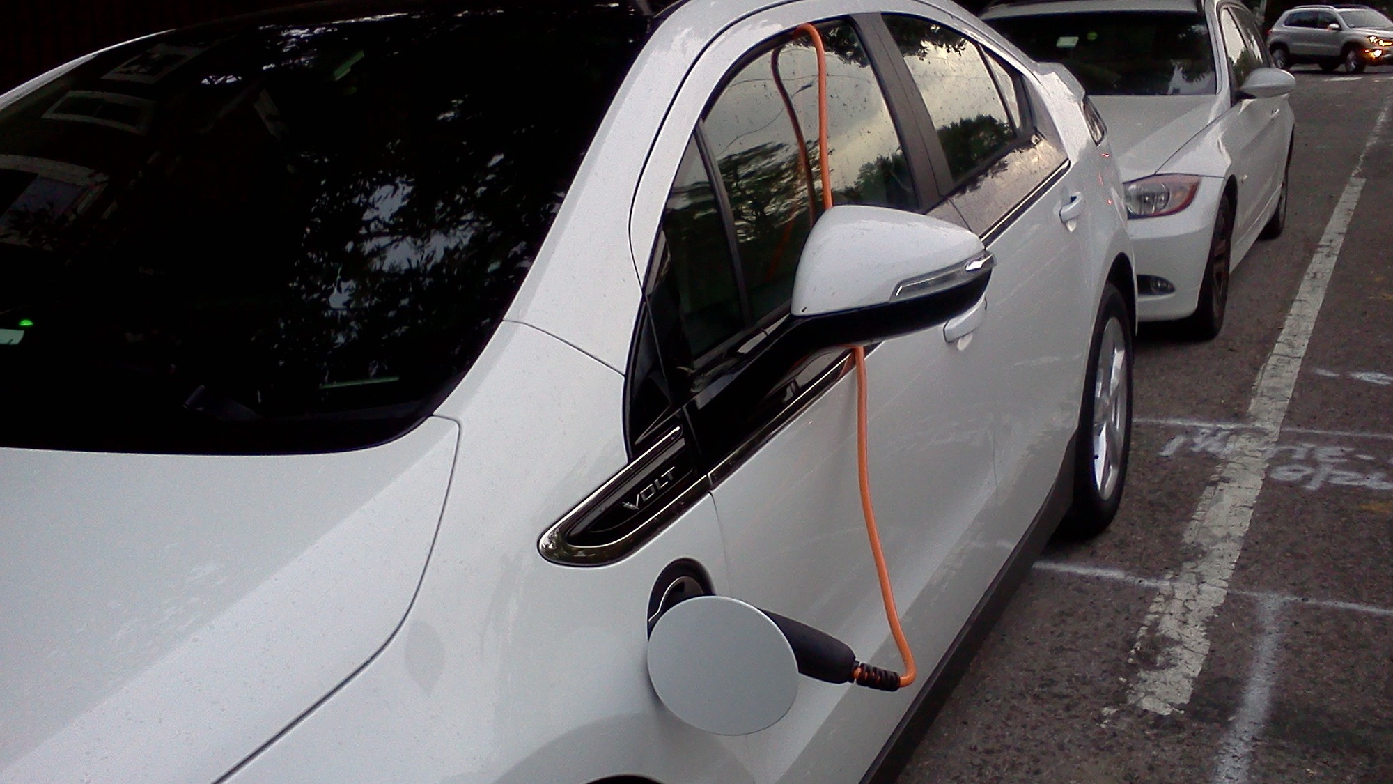 Chevy Volt recharging on the street in Cambridge, MA   [photos: John C. Briggs]