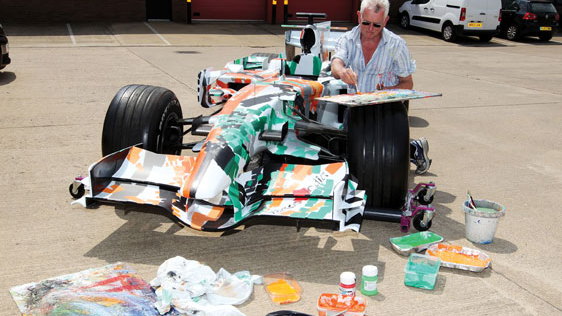 The former Force India F1 car, repainted by Dexter Brown. Image: RM Auctions