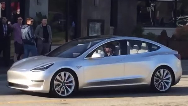 Tesla Model 3 Driving on a Public Road