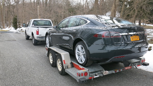 2013 Tesla Model S electric sport sedan on delivery day, with owner David Noland