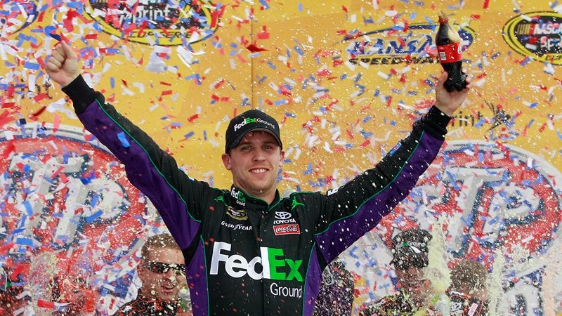 Denny Hamlin celebrates his second 2012 win at Kansas - NASCAR photo