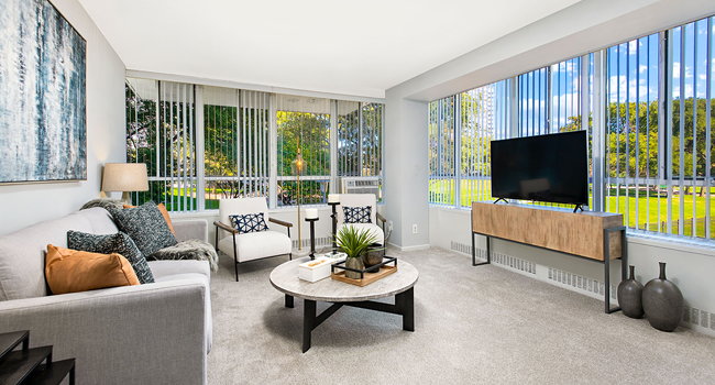 Lake Meadows Apartments offers a desirable blend of size and value, like this spacious, sun-filled living room in our 3-Bedroom Sheridan floor plan.